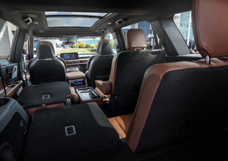 The interior of the 2025 Lincoln Aviator® SUV is shown with two seats folded down for added space. | Johnson Brothers Lincoln in Temple TX