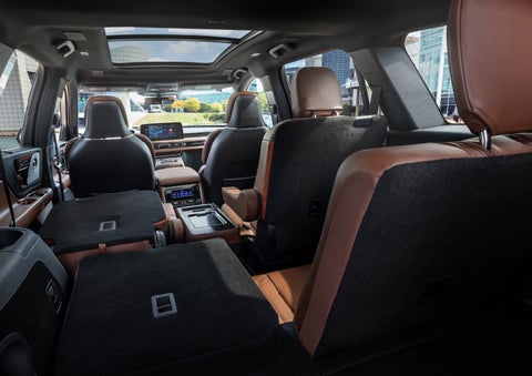 The interior of the 2025 Lincoln Aviator® SUV is shown with two seats folded down for added space. | Johnson Brothers Lincoln in Temple TX