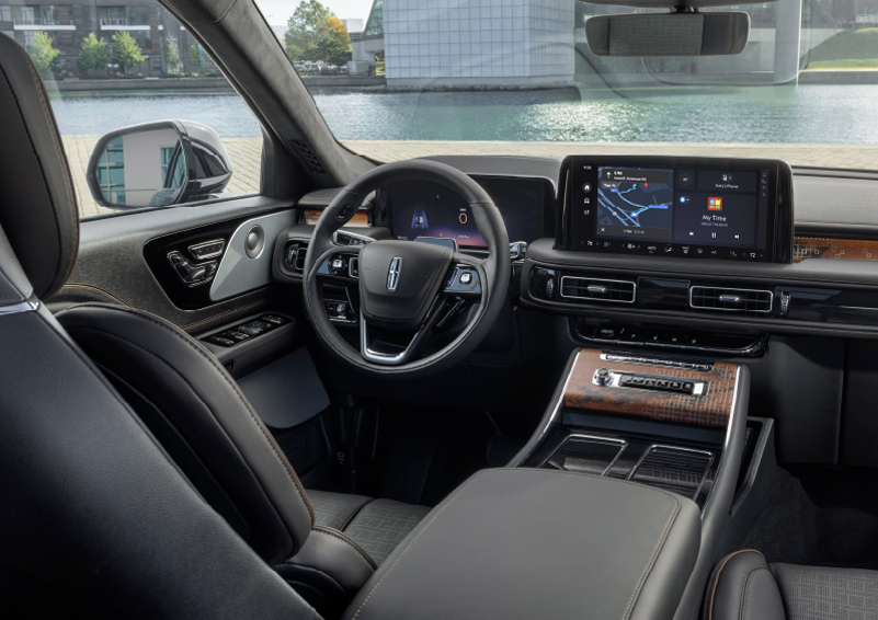 The interior of the 2025 Lincoln Aviator® SUV is shown parked with a view of a harbor through the windshield. | Johnson Brothers Lincoln in Temple TX