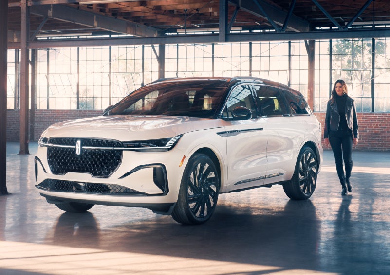 A person approaches a 2025 Lincoln Nautilus® SUV. | Johnson Brothers Lincoln in Temple TX