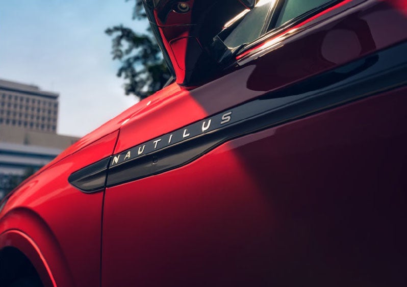 A side badge on the passenger door reads Nautilus. | Johnson Brothers Lincoln in Temple TX