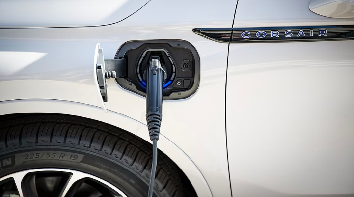 An electric charger is shown plugged into the charging port of a Lincoln Corsair® Grand Touring
model. | Johnson Brothers Lincoln in Temple TX
