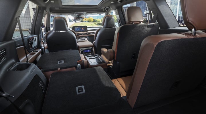 One side of the PowerFold® third-row seat and a second-row seat are folded forward in the 2026 Lincoln Aviator® SUV. | Johnson Brothers Lincoln in Temple TX