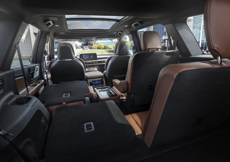 One side of the PowerFold® third-row seat and a second-row seat are folded forward in the 2026 Lincoln Aviator® SUV. | Johnson Brothers Lincoln in Temple TX