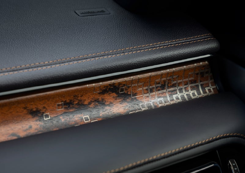 A close-up shot of the 2026 Lincoln Aviator® dashboard with unique black and brown accents and brown stitching. | Johnson Brothers Lincoln in Temple TX