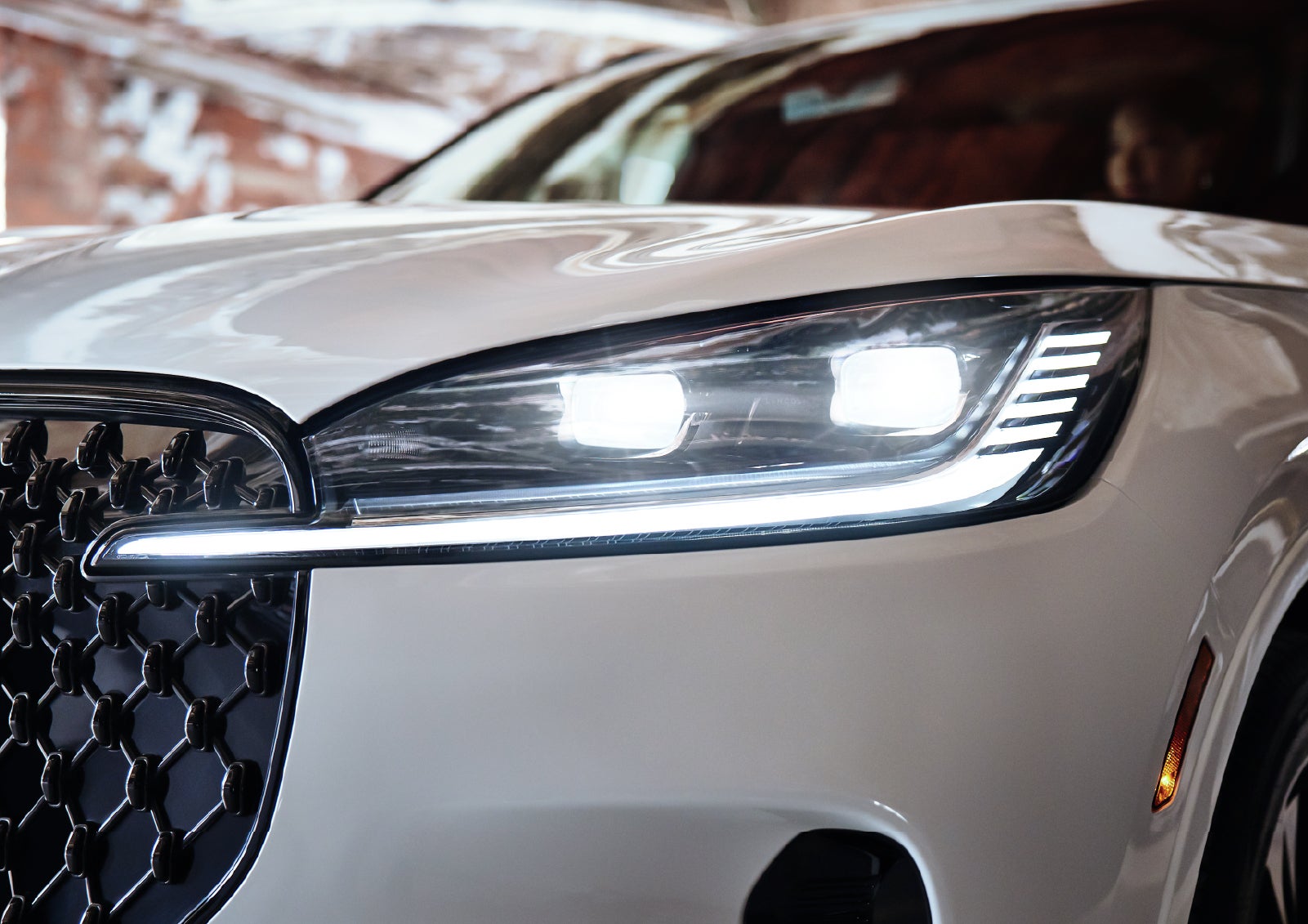 A close-up of a headlamp on the 2027 Lincoln Aviator® SUV is shown. | Johnson Brothers Lincoln in Temple TX